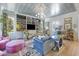 Spacious living room featuring built-in bookshelves and luxury furnishings at 912 Cheehaw St, Edisto Island, SC 29438