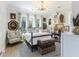 Cozy main bedroom with plenty of natural light and decorative accents at 912 Cheehaw St, Edisto Island, SC 29438