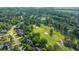 Stunning aerial view of a golf course community with lush greenery and well-maintained homes at 1187 Out Of Bounds Dr, Summerville, SC 29485