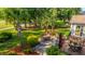 A spacious backyard deck offers ample room for seating and dining, surrounded by trees and greenery at 1187 Out Of Bounds Dr, Summerville, SC 29485