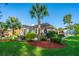 A lush backyard offers a tranquil outdoor experience and features a well-manicured lawn and landscaping at 1187 Out Of Bounds Dr, Summerville, SC 29485