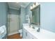 Well-lit bathroom featuring an enclosed shower and a bright vanity at 1187 Out Of Bounds Dr, Summerville, SC 29485