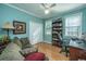 Bedroom with a comfortable couch, built-in bookcase, and natural light at 1187 Out Of Bounds Dr, Summerville, SC 29485