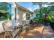 Outdoor deck with patio furniture, overlooking a beautifully landscaped yard at 1187 Out Of Bounds Dr, Summerville, SC 29485