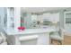 Stylish kitchen boasts marble countertops, white cabinetry, stainless steel appliances and a breakfast bar with seating at 1187 Out Of Bounds Dr, Summerville, SC 29485