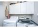 Bright laundry room with updated machines and additional storage at 1187 Out Of Bounds Dr, Summerville, SC 29485