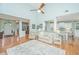 Open living space with hardwood floors, vaulted ceiling, and sight lines to kitchen at 1187 Out Of Bounds Dr, Summerville, SC 29485