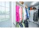 Walk-in closet features custom shelves and hanging rods at 1187 Out Of Bounds Dr, Summerville, SC 29485