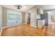 Cozy dining area with natural light from large windows, adjacent to the kitchen at 1210 Azalea Dr, Summerville, SC 29483