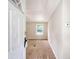 Inviting entryway with neutral paint, plush carpet, and natural light from the window at 1210 Azalea Dr, Summerville, SC 29483