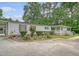 Charming one story home with mature landscaping, white trim, driveway and covered entry at 1210 Azalea Dr, Summerville, SC 29483