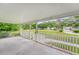 View from the front porch showcasing the neighborhood and a glimpse of the community at 1210 Azalea Dr, Summerville, SC 29483