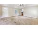 Inviting living room with a view into the kitchen, carpet flooring, and natural light at 1210 Azalea Dr, Summerville, SC 29483