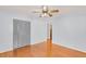 Bedroom features wood floors, a ceiling fan, and a closet for plenty of storage at 1222 Maxwell St, North Charleston, SC 29405