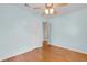 Bedroom has wood floors, a ceiling fan, and a closet for ample storage space at 1222 Maxwell St, North Charleston, SC 29405