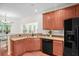 Well-lit kitchen featuring stainless steel appliances, ample cabinetry, and sleek countertops at 1223 Creek Stone Way, Hanahan, SC 29410