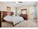 Cozy main bedroom with carpet, windows, and dresser at 1223 Creek Stone Way, Hanahan, SC 29410