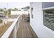Inviting outdoor space, perfect for dining and relaxing with its cozy furniture and natural light at 126-C Jungle Rd, Edisto Beach, SC 29438
