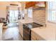 Bright kitchen with stainless steel appliances and a light backsplash at 126-C Jungle Rd, Edisto Beach, SC 29438
