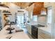 Bright kitchen view with white countertops, stainless appliances and an open living area at 126-C Jungle Rd, Edisto Beach, SC 29438