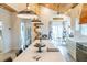 Modern kitchen featuring white countertops, stainless appliances, and stylish lighting at 126-C Jungle Rd, Edisto Beach, SC 29438