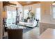 Cozy living room with a white sofa, area rug, and a bright window view at 126-C Jungle Rd, Edisto Beach, SC 29438