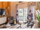 Stylish living room featuring modern decor, comfortable seating, and a view of the outdoors at 126-C Jungle Rd, Edisto Beach, SC 29438