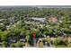 Aerial view of a neighborhood featuring lush greenery and residential homes at 1383 W Lenevar Dr, Charleston, SC 29407