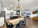 Bright and open living space with a stylish dining area, modern kitchen, and comfortable seating at 1441 Arabella St, Charleston, SC 29414