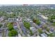 Aerial view of neighborhood featuring mature trees and well-maintained streets at 15 Dewey St, Charleston, SC 29403