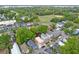 Aerial view of neighborhood featuring mature trees and well-maintained streets at 15 Dewey St, Charleston, SC 29403