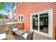 Relaxing back deck featuring comfortable seating and sliding glass doors at 15 Dewey St, Charleston, SC 29403