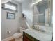 Chic powder room with marble countertop, elegant mirror, and modern fixtures at 15 Dewey St, Charleston, SC 29403