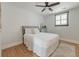 Serene bedroom with hardwood floors, soft decor, and natural light, creating a peaceful retreat at 15 Dewey St, Charleston, SC 29403