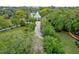 Scenic aerial view of a charming gazebo surrounded by lush greenery and mature trees in a park-like setting at 15 Dewey St, Charleston, SC 29403