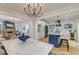 Open-concept kitchen with a marble island, modern lighting, and stainless steel appliances at 15 Dewey St, Charleston, SC 29403