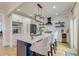 Charming kitchen featuring a stylish island, modern fixtures, and bright lighting at 15 Dewey St, Charleston, SC 29403