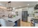Spacious kitchen featuring custom cabinets and a marble countertop island at 15 Dewey St, Charleston, SC 29403