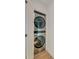 Conveniently located in-unit stainless steel stackable washer and dryer in closet at 15 Dewey St, Charleston, SC 29403