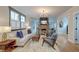 Elegant living room with brick fireplace, hardwood floors, and stylish furniture at 15 Dewey St, Charleston, SC 29403