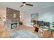 Cozy office with brick fireplace, hardwood floors, and natural light at 15 Dewey St, Charleston, SC 29403