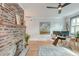 Cozy office with brick fireplace, hardwood floors, and natural light at 15 Dewey St, Charleston, SC 29403