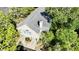 Aerial shot of a home surrounded by mature shade trees and professional landscaping at 1551 Ben Sawyer Blvd # 23, Mount Pleasant, SC 29464