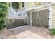 Outdoor patio with brick pavers and access to basement storage at 1551 Ben Sawyer Blvd # 23, Mount Pleasant, SC 29464