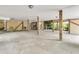 Spacious basement area with wood supports, concrete floor, and stairs at 1551 Ben Sawyer Blvd # 23, Mount Pleasant, SC 29464
