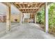 Basement area with wooden supports, stairs, and access to the yard at 1551 Ben Sawyer Blvd # 23, Mount Pleasant, SC 29464