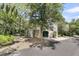 Exterior of home with basement parking and lush landscaping at 1551 Ben Sawyer Blvd # 23, Mount Pleasant, SC 29464