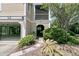 Lovely home featuring a screened-in porch, an open carport, and mature landscaping for a welcoming exterior at 1551 Ben Sawyer Blvd # 23, Mount Pleasant, SC 29464