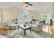 Open floor plan showcases a bright living room next to the dining area at 1551 Ben Sawyer Blvd # 23, Mount Pleasant, SC 29464