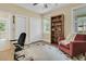 Bright office space with built-in shelving and natural light, ideal for remote work or study at 1551 Ben Sawyer Blvd # 23, Mount Pleasant, SC 29464